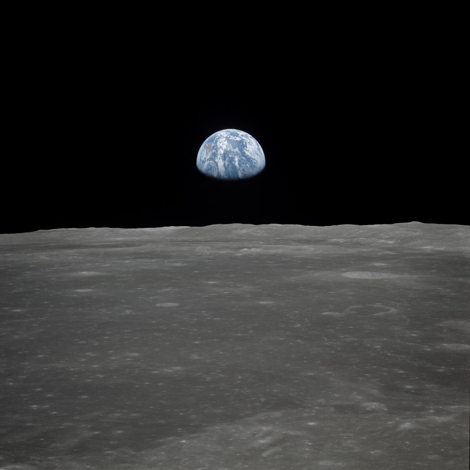 Earth rising over the Moon